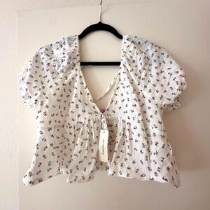 NWT Francesca’s Floral Peplum Top